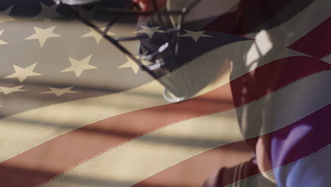 american flag animation over close-up of person wearing glasses