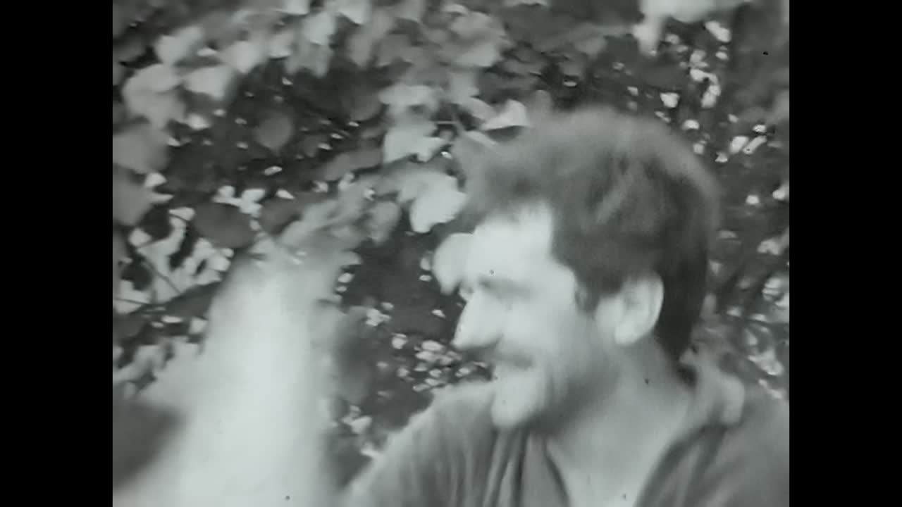 Group of People Standing Together in Soviet Union Archive. CIRCA USSR 1980s: A historical archive video capturing a group of people standing close to each other in the Soviet Union.