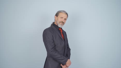 businessman winking at camera.