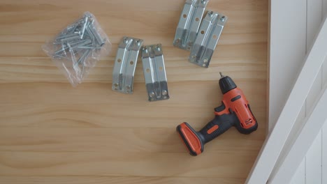 furniture assembly process with tools and parts