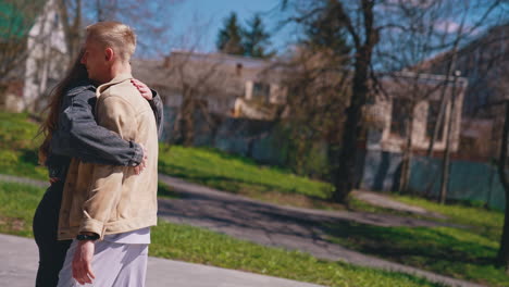 happy couple in love holding hands of each other while spending time together in the park. romantic date concept