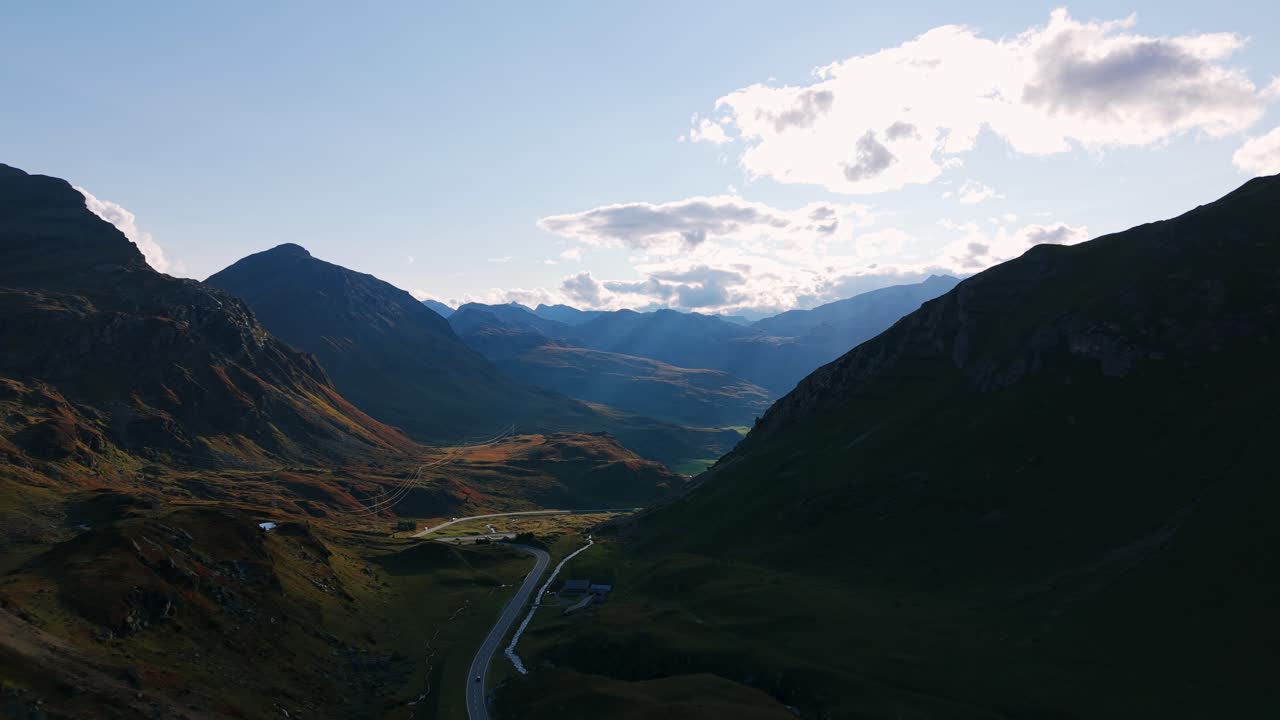 Scenic Aerial View of Julier Pass Road in Switzerland Alps Mountains Under Cloudy Sky Travel Destination and Transportation Concept Summer Landscape