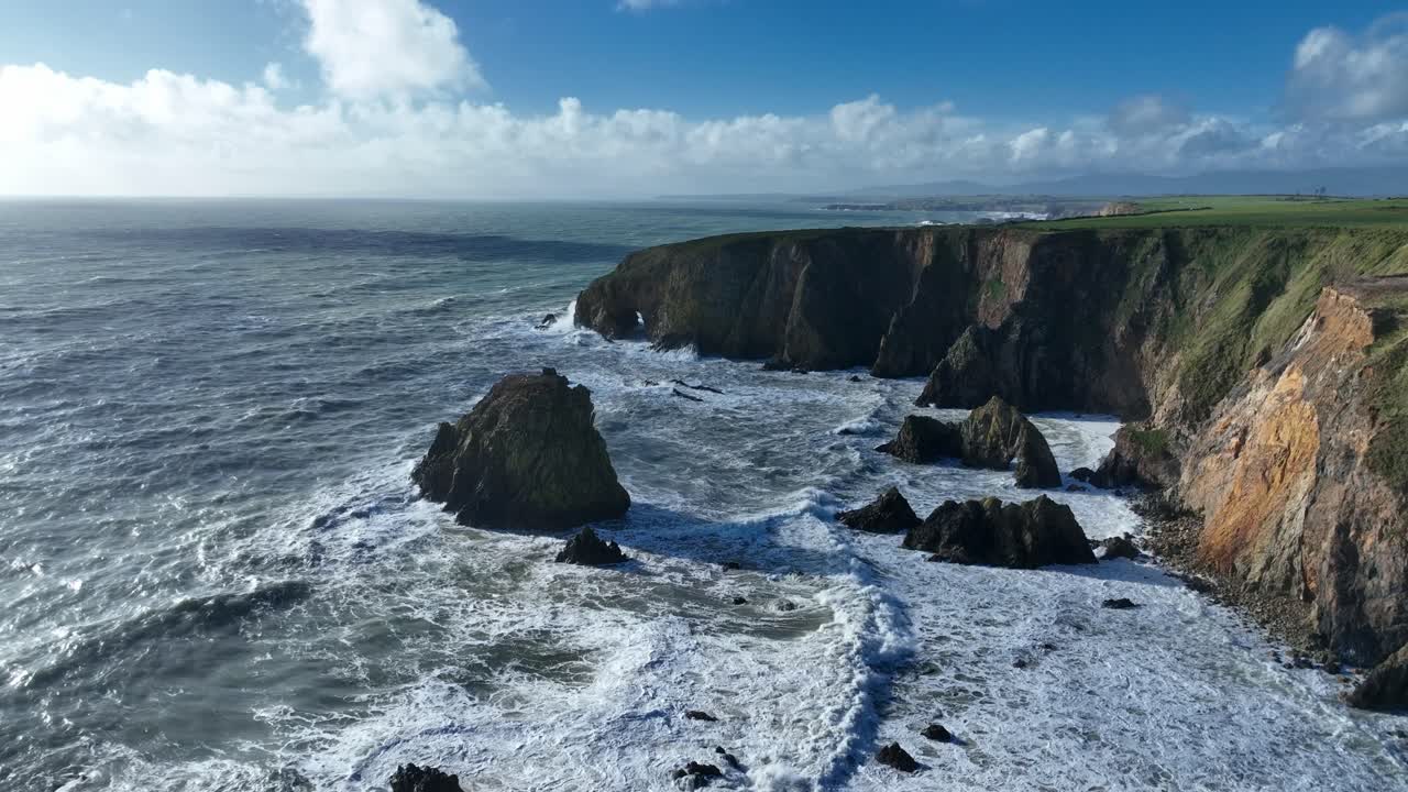 Ireland epic Locations massive waves in winter storm crash ashore battering sea cliffs scarred by costal erosion