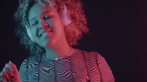woman listening to music, neon lighting