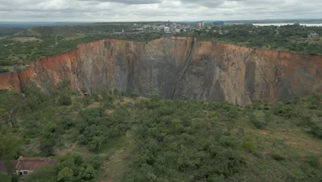 aerial retreat from rim of cullinan diamond mine big hole in s africa