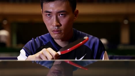 intense table tennis player focus