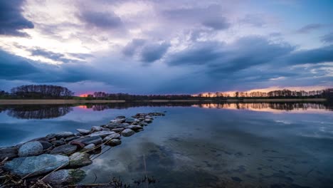 cloudy sunset sky on a lake, kashubia, poland