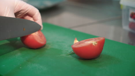 hands cutting tomatoes. chef cutting fresh and delicious vegetables for cooking