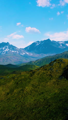 stunning view of a mountain range with snowy peaks