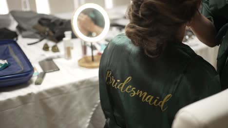 bridesmaid getting ready for wedding day
