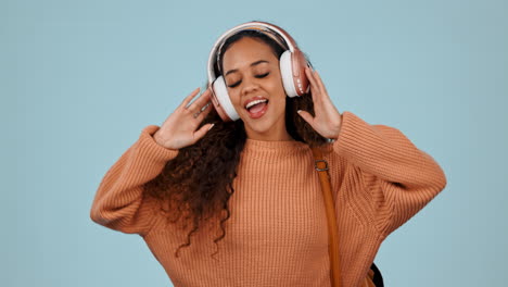 Headphones,-dancing-and-happy-woman-student