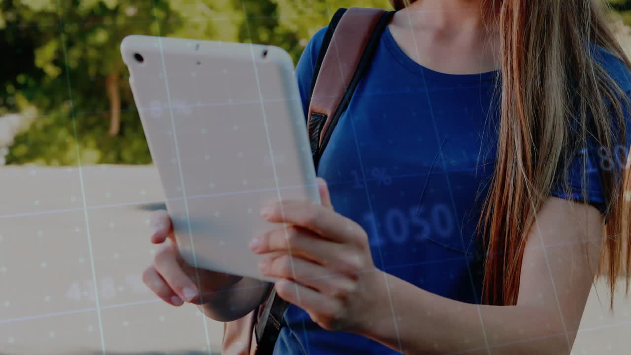 Teen female tapping white tablet outdoors, using learning app and watching animated icons appearing