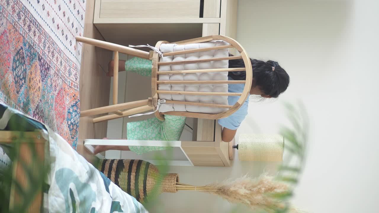 Person working or studying at a desk in a room