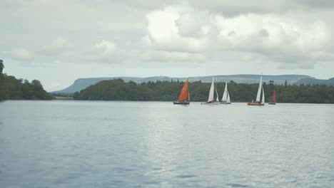 incredible scenic shot of sailboats on lake