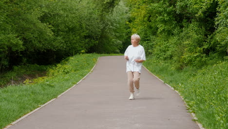 senior woman walking in a park