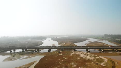 view of the busiest bridge all over the punjab constructed on river