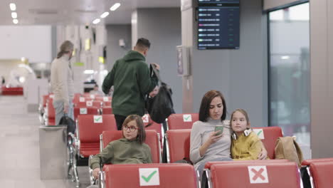 passengers waiting in departure lounge