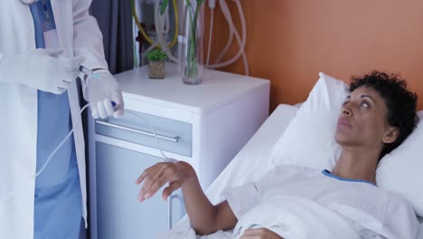 female patient in a hospital bed