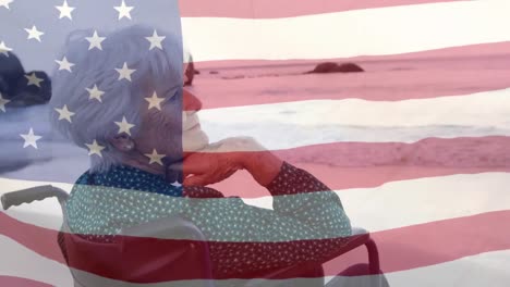 Old-caucasian-woman-with-US-flag-waving-foreground