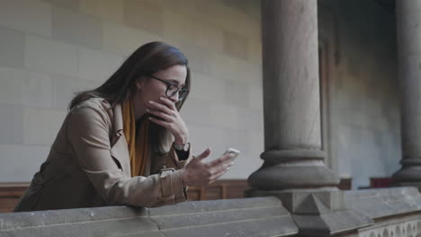 student reading bad news on phone