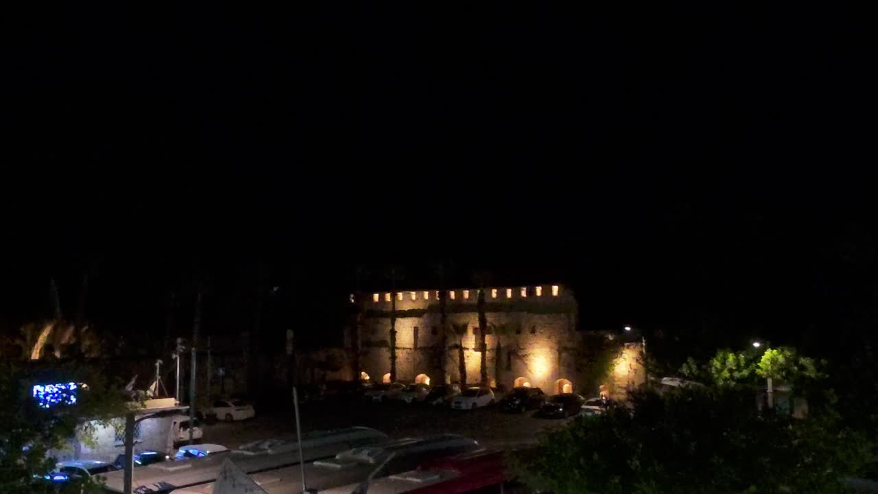 Ancient Stone Fortress in Acre Lit Up with Warm Lights