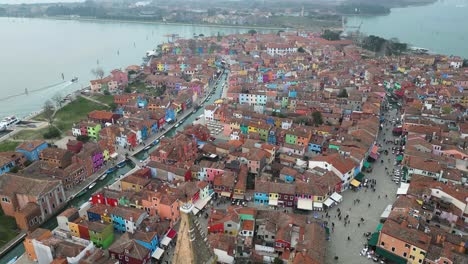 Aerial-View-of-Panorama-of-Painted-House-Facades-of-Burano,-Island-Province-of-Venice-in-Italy-on-a-Foggy-Day