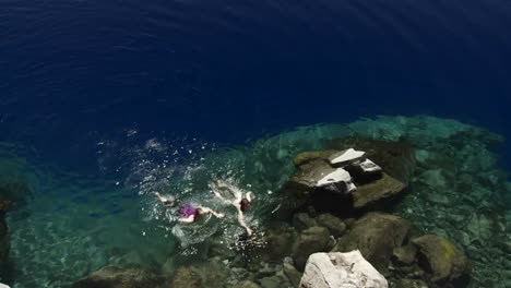 People-swim-in-the-clear-waters-of-Crater-Lake-Oregon