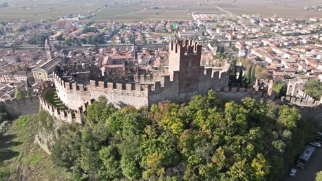 aerial view of soave castle - scaligero castle of soave on a sunny day in verona, italy