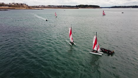 Aerial-view-of-catamaran-boat-regatta-in-front-of-Saint-Malo-in-France