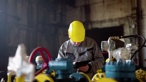 worker with hardhat at the factory