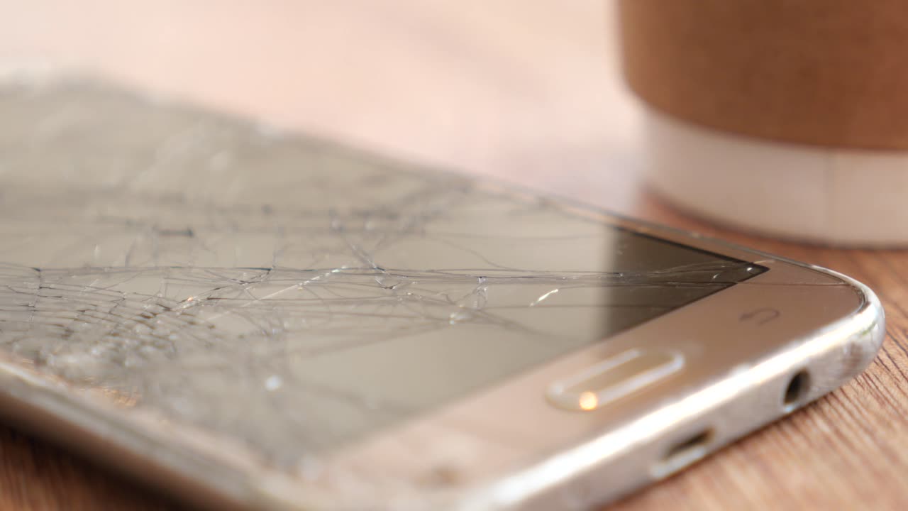 Damaged Smartphone with Broken Screen