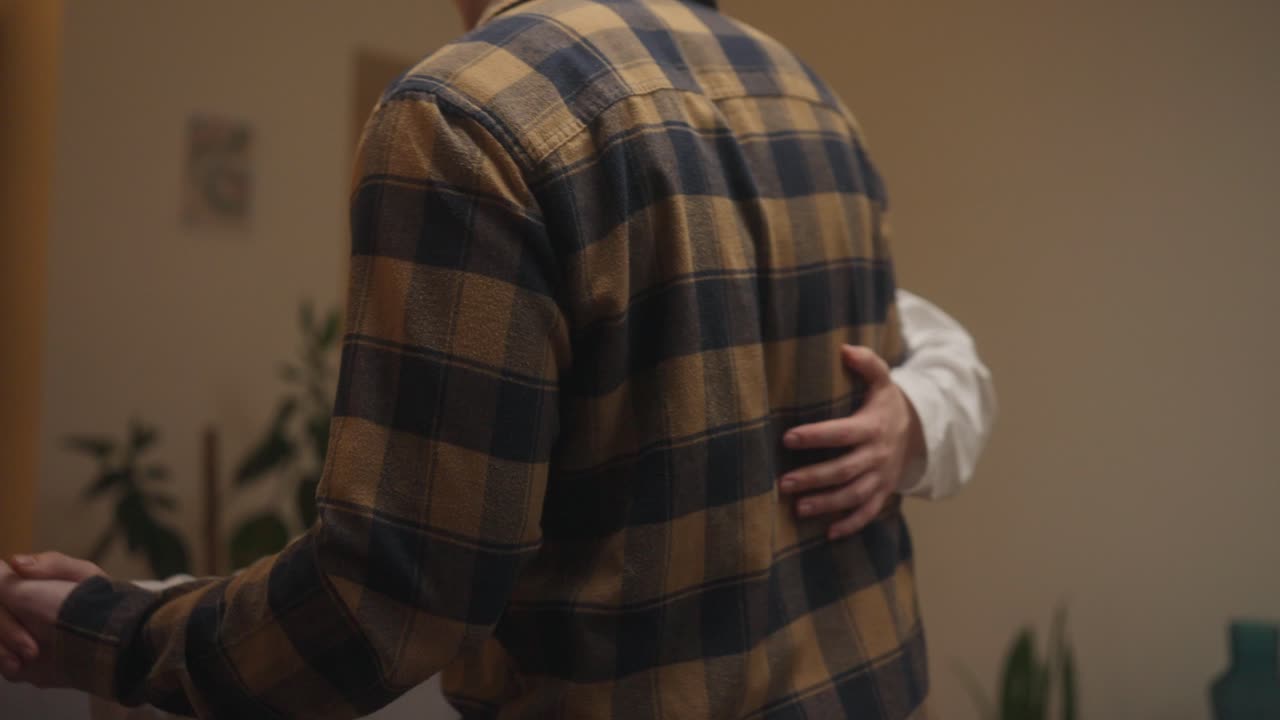 Couple Embracing Indoors