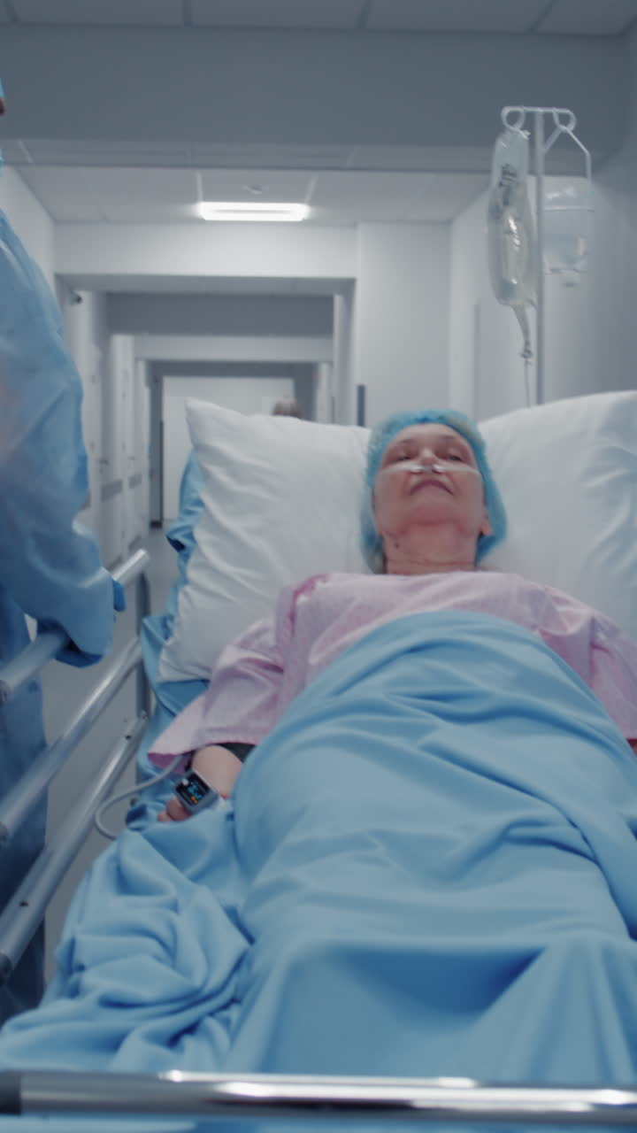 Doctors push stretcher with elderly woman 4k 2025 07 22 10 32 20 utc.mov | adult, african american, assistance, care