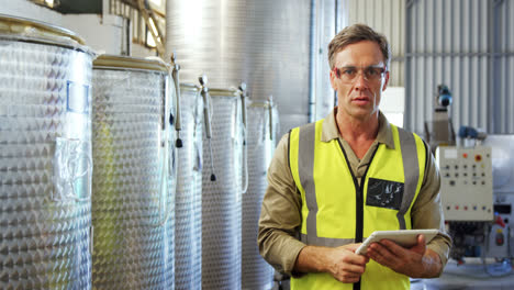 worker using digital tablet