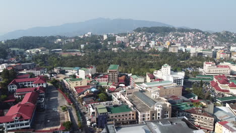 Drone-shot-of-high-rise-buildings-in-Baguio-City,-Philippines