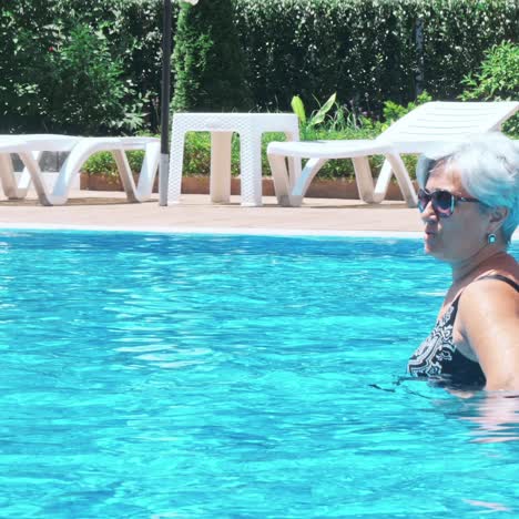 happy family having fun in the swimming pool.