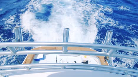 High-angle-view-of-yacht-wake-seen-from-upper-level,-Slow-Motion