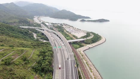 traffic on a rural highway interchange in hong kong, aerial view