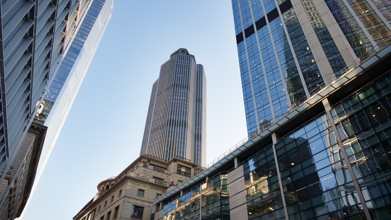 Low angle view of modern glass skyscrapers in the heart of London's financial district
