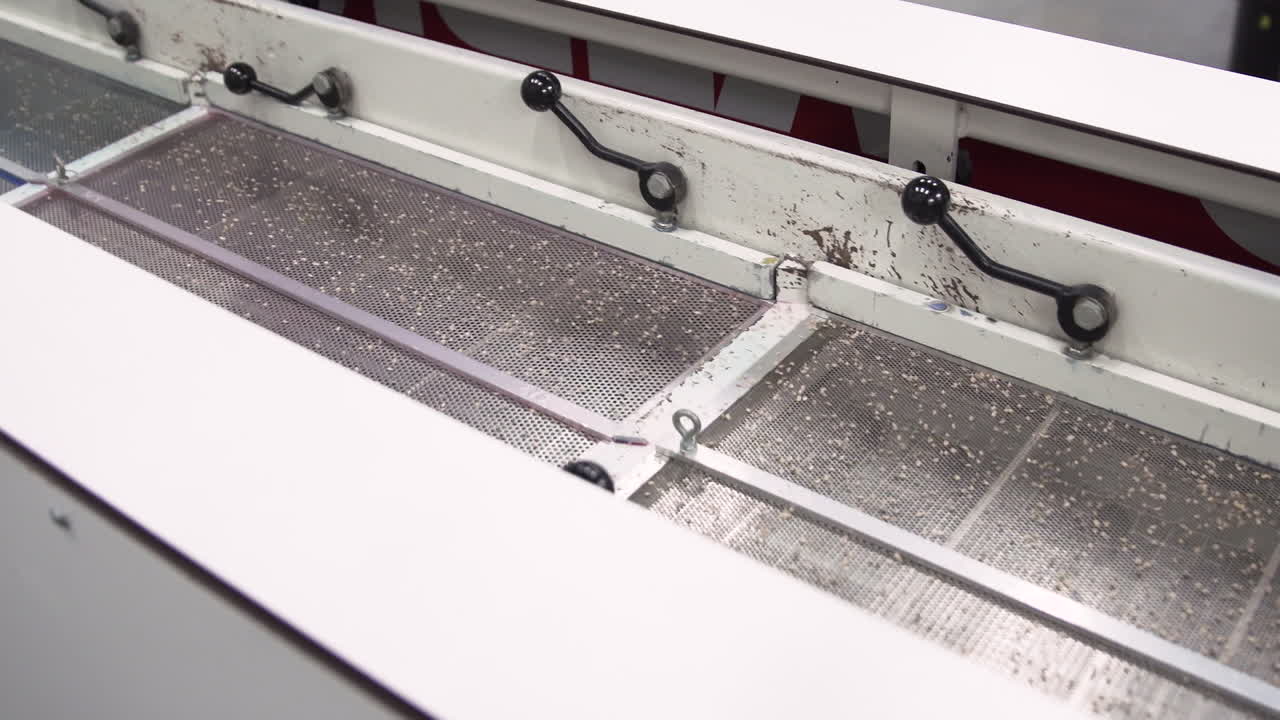 Seed Divider Shaking in Slow Motion to Divide Smallest Seeds from Larger Ones, Top Down View Wide