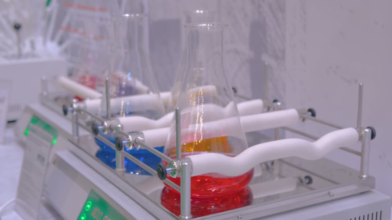 Orbital shaker for mixing, shaking, blending biological samples in glass vials