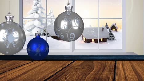 Animation-of-christmas-baubles-decoration-and-snow-falling-seen-through-window