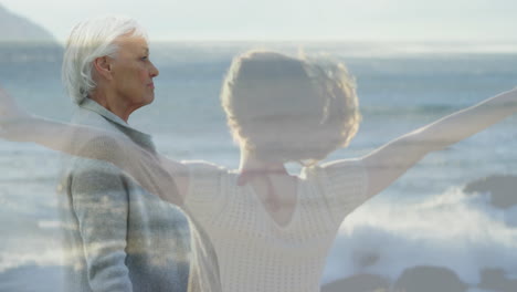 old woman walking at a beach 4k