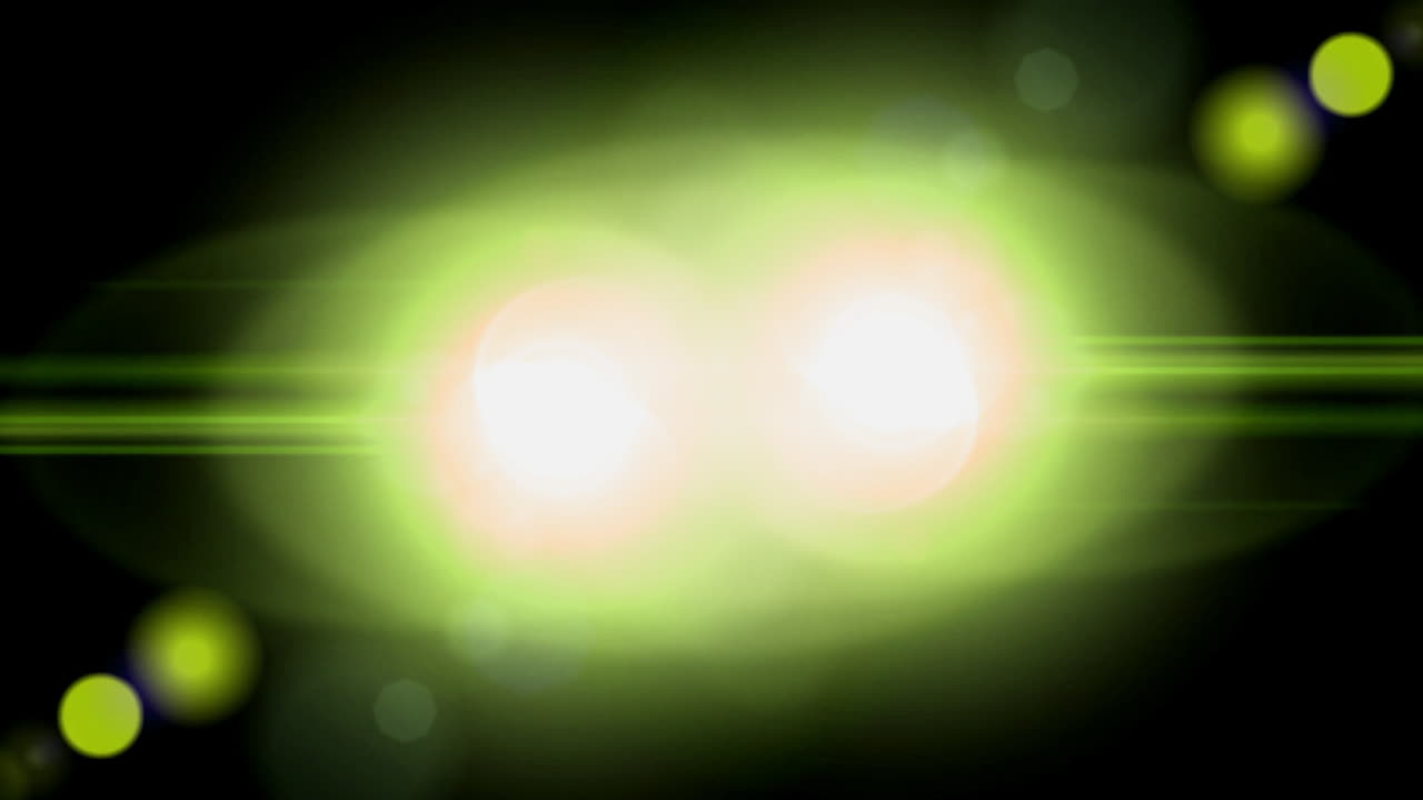 Sfondo astratto in movimento con bagliori dell'obiettivo verde e giallo luminescenti.