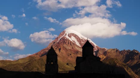 amazing aerial view above gergeti trinity church, georgia