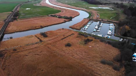 aerial - marina on river waveney, somerleyton, england, wide forward shot