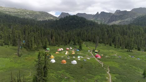 aerial view of camping tents in the mountains