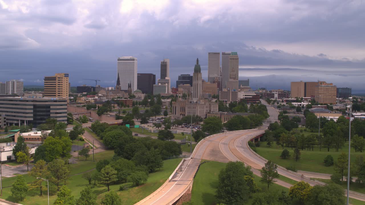 Establishing shot of downtown Tulsa, Oklahoma with overcast cloudy sky