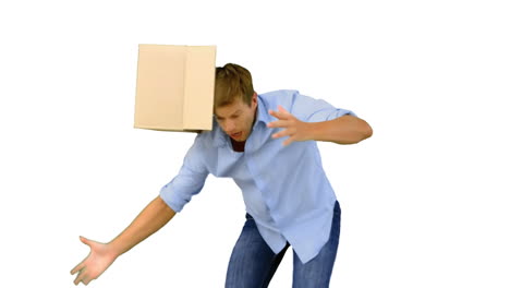 clumsy man dropping boxes down on white screen