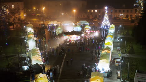 Drone-view-of-Christmas-stalls-and-carousel-on-the-Podgorski-Square-with-St